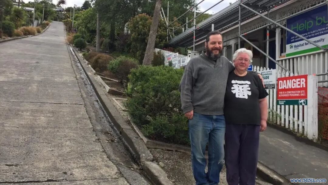 Matthew and Vivien Dwyer outside their property on Baldwin St, Dunedin, the world's steepest street.
